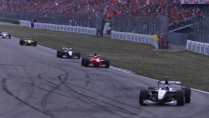 Mika Hakkinen leads Mika Salo in the early stages of the 1999 German Grand Prix