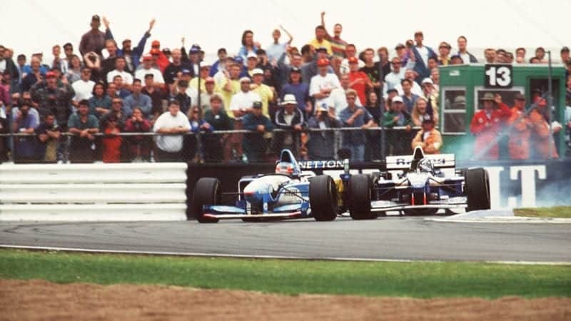 Damon Hill collides with Michael Schumacher's Benetton at the 1995 British Grand Prix