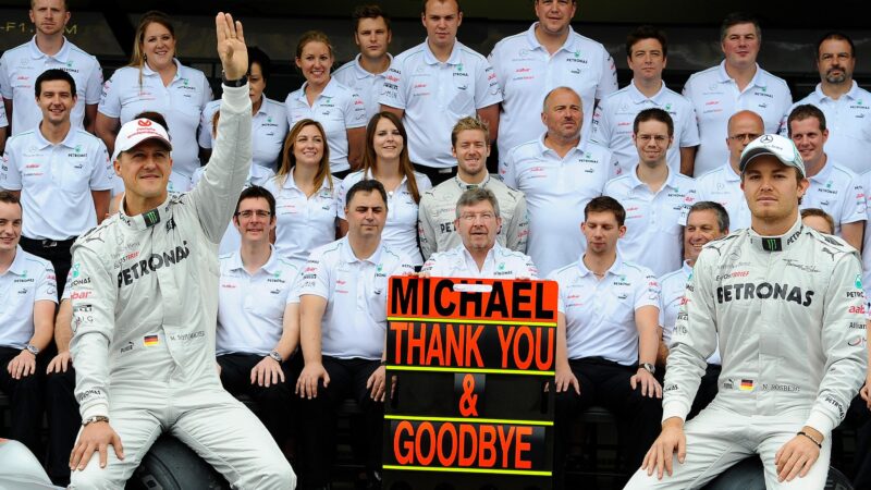 Mercedes team photo with Nico Rosberg and Michael Schumacher who had completed his last race for the team at the 2012 F1 Brazilian Grand Prix