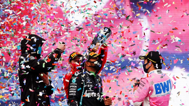 Toto Wolff, Sebastian Vettel and Sergio PErez spray Lewis Hamilton with champagne on the Istanbul PArk p[odium after the 2020 F1 Turkish Grand Prix