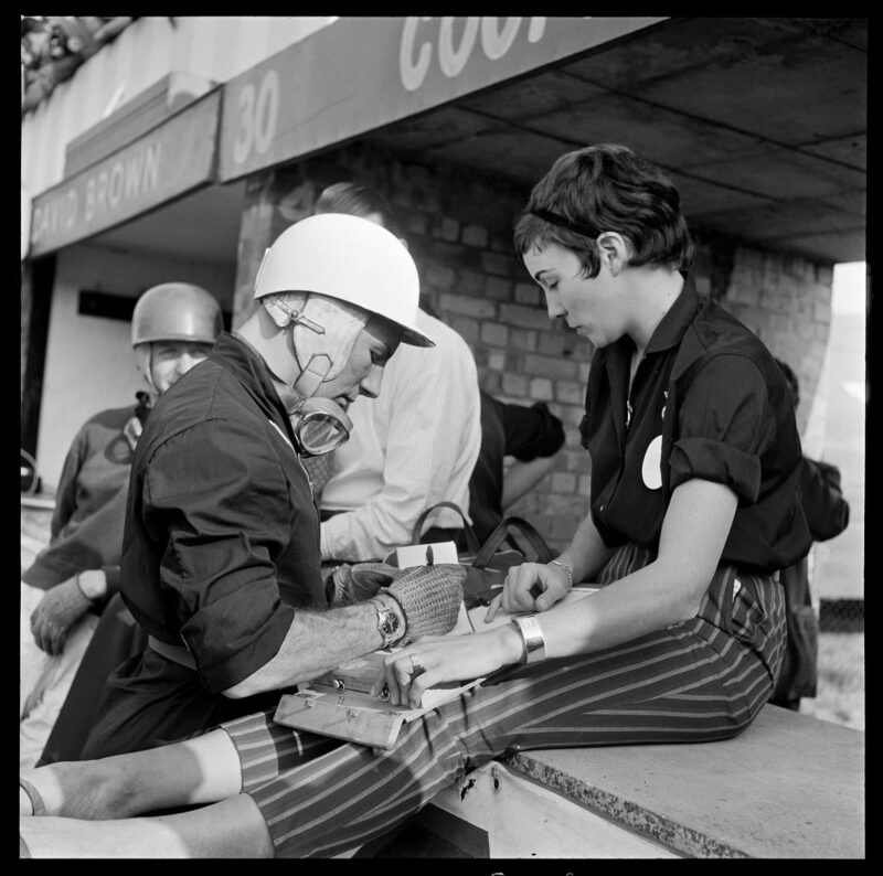 Stirling Moss with first wife Katie at Silverstone in 1958