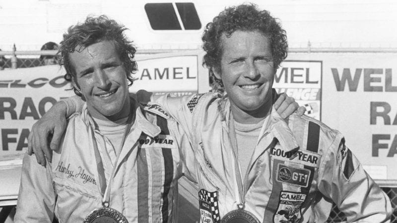 DAYTONA BEACH, FL — Mid-1970s: Peter Gregg (L) and Hurley Haywood (R) co-drove a Porsche 911 to victory in the 24 Hours of Daytona at Daytona International Speedway in both 1973 and 1975. (Photo by ISC Images & Archives via Getty Images)