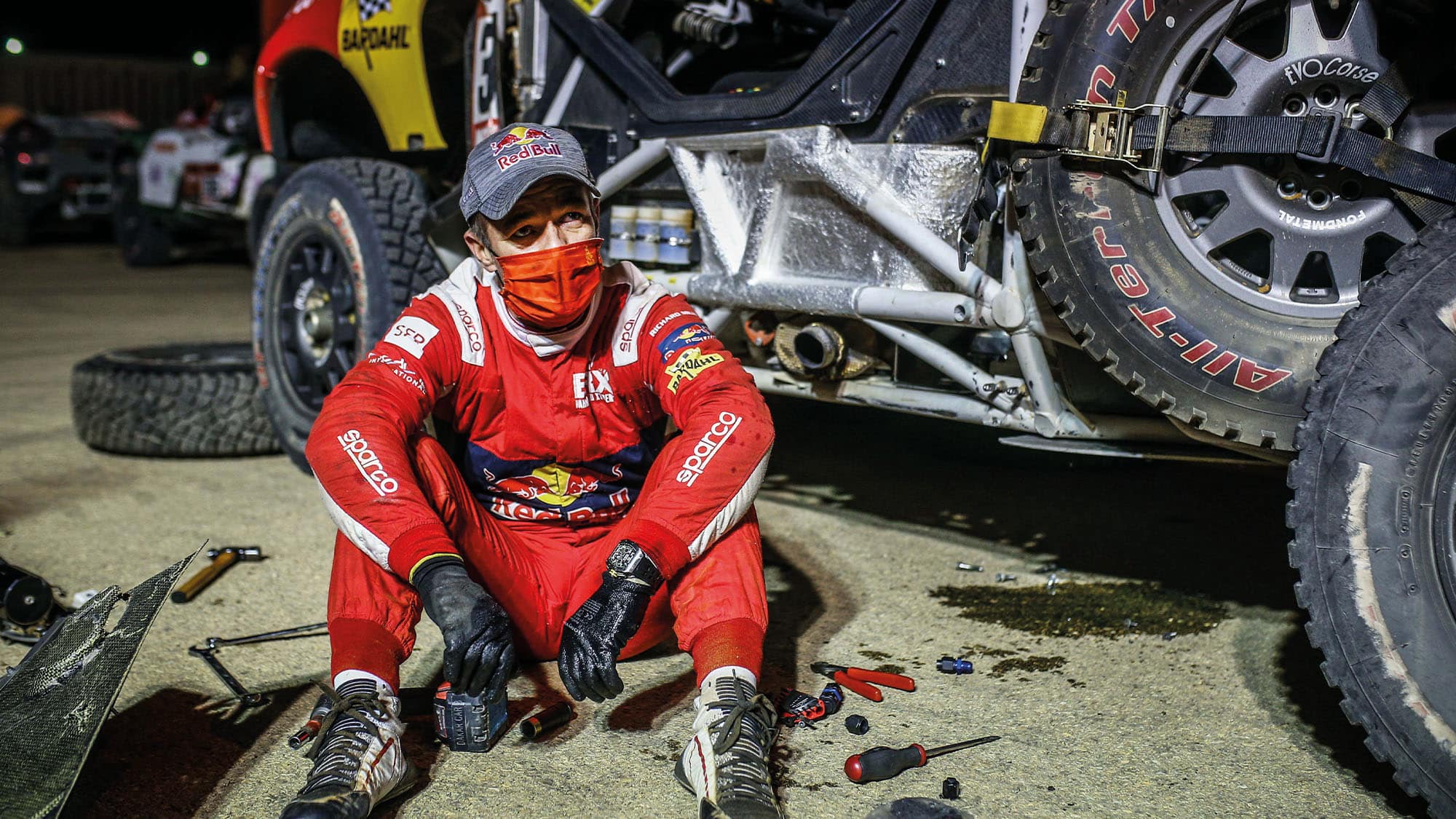 Sebastien Loeb sat next to his 2021 Dakar BRX