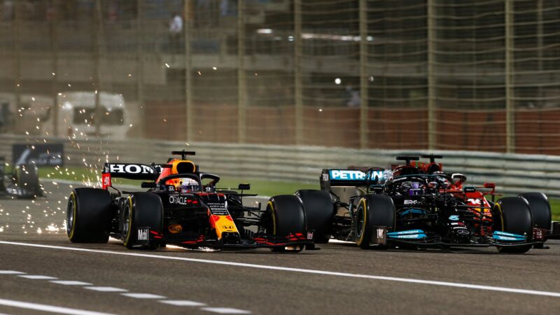 Lewis Hamilton alongside Max Verstappen