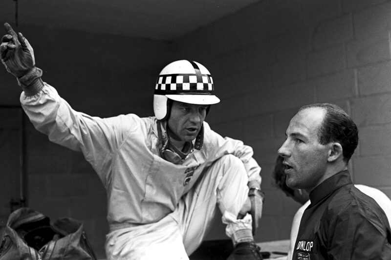 Innes Ireland and Stirling Moss at the 1960 Belgian Grand Prix