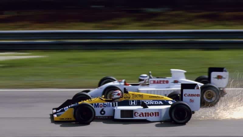 Nelson Piquet overtakes Pascal Fabre in a shower of sparks at the 1987 Brazilian Grand Prix