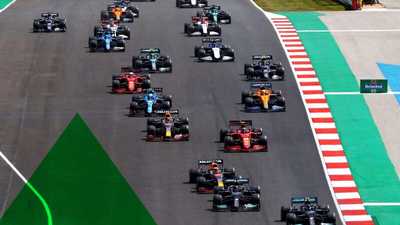 PORTIMAO, PORTUGAL - MAY 02: Valtteri Bottas of Finland driving the (77) Mercedes AMG Petronas F1 Team Mercedes W12 leads Lewis Hamilton of Great Britain driving the (44) Mercedes AMG Petronas F1 Team Mercedes W12 and Max Verstappen of the Netherlands driving the (33) Red Bull Racing RB16B Honda during the F1 Grand Prix of Portugal at Autodromo Internacional Do Algarve on May 02, 2021 in Portimao, Portugal. (Photo by Dan Istitene - Formula 1/Formula 1 via Getty Images)