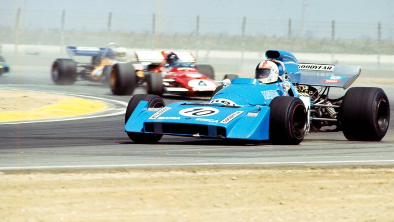 UNITED STATES - MARCH 30: 1971 Questor Grand Prix. Chris Amon(10) of Matra Sports in his MS 120B, drives in front of Mario Andretti(4) of Scuderia Ferrari. Andretti will go on to win the race in his flat twelve Ferrari 312B. (Photo by Bob D'Olivo/The Enthusiast Network via Getty Images/Getty Images)