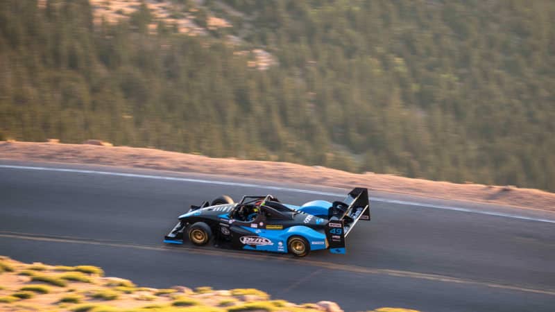 Robin Shute driving up Pike's Peak in his Wolf in 202