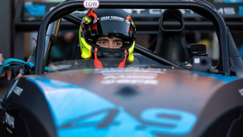 Robin Shute stares out from his helmet on Pike's Peak in 2021