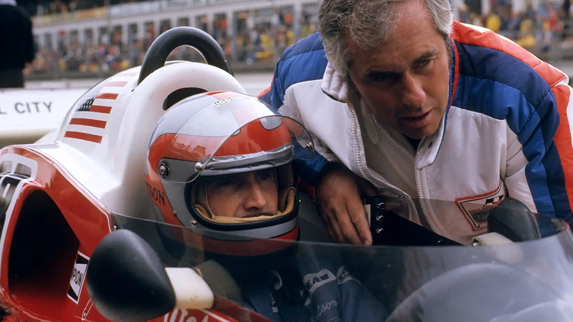 John Watson, Roger Penske, Penske-Ford PC4, Grand Prix of Germany, Nurburgring, 01 August 1976. John Watson with team owner Roger Penske. (Photo by Paul-Henri Cahier /Getty Images)