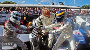 Allan McNish and David Brabham put ona. fight for the 2009 Le Mans winners trophy