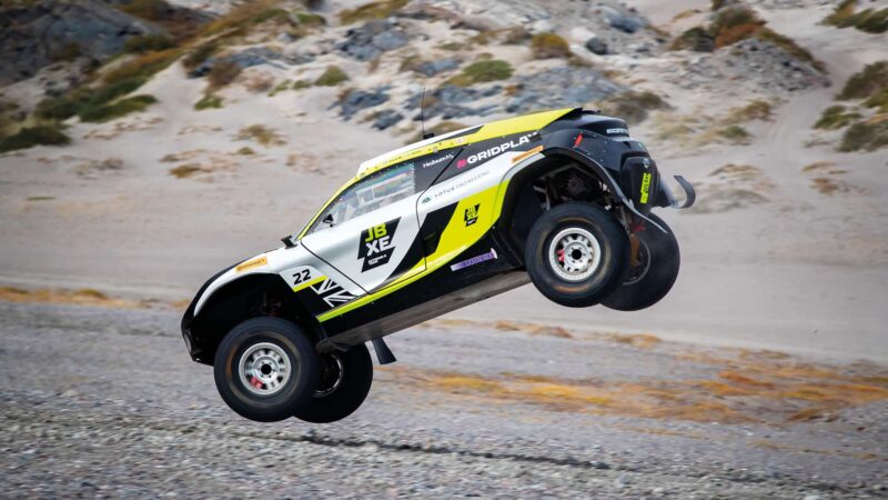 Jenson Button team Extreme E car in mid air