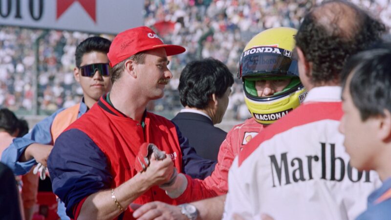 Nigel Mansell shakes hands with Ayrton Senna at Suzuka 1991