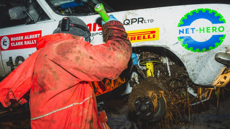 Crew works on Hillman Avenger in Roger Albert Clark Rally