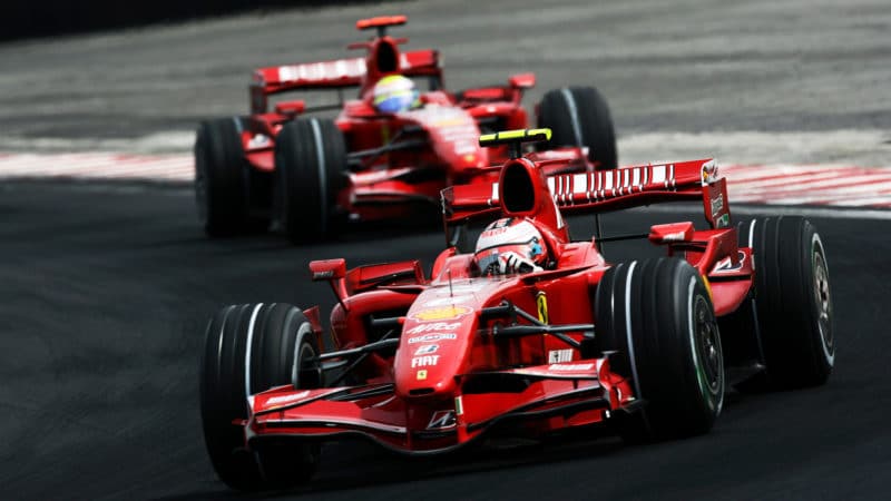 Kimi Raikkonen leads Felipe Massa in the 2007 Brazilian grand prix
