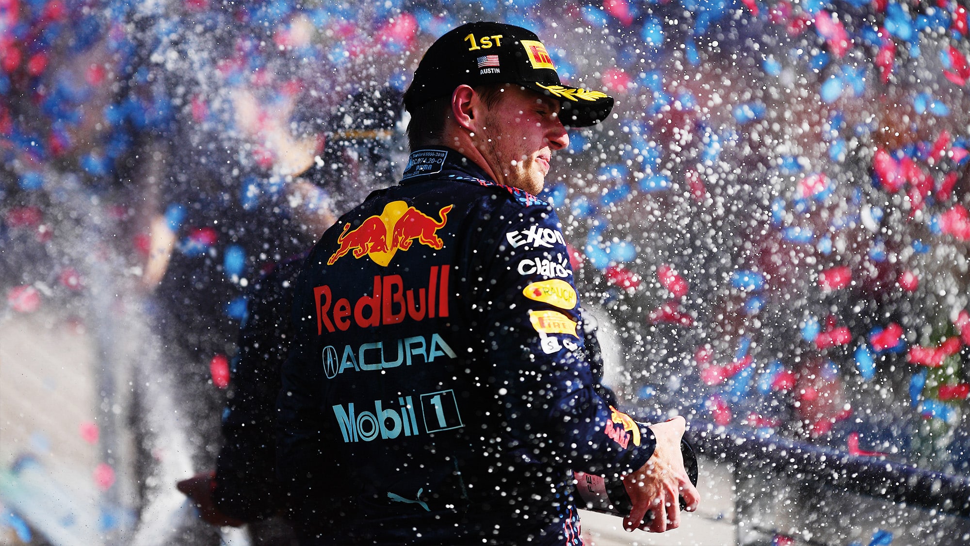 Max Verstappen sprays champagne after winning the 2021 Mexican Grand Prix