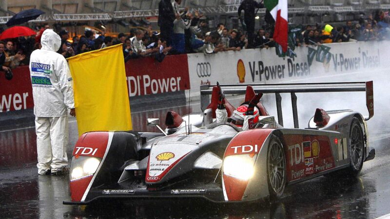 Le Mans, FRANCE: Italian driver Emmanuel Pirro takes a curve with his Audi R10 TDI during the 75th edition of the Le Mans 24 Hours Race, 17 June 2007 in Le Mans, western France. German duo Frank Biela and Marco Werner along with Italian driver Emanuele Pirro won the Le Mans 24 hour race in an Audi for the second successive year. They beat home a Peugeot driven by Sebastien Bourdais, Stephane Sarrazin and Pedro Lamy. AFP PHOTO ANDRE DURAND (Photo credit should read ANDRE DURAND/AFP via Getty Images)