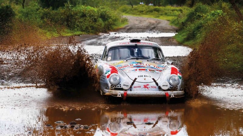 Round the World Porsche 356 splashing through a pool of water copy
