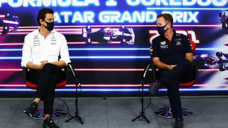 DOHA, QATAR - NOVEMBER 19: Mercedes GP Executive Director Toto Wolff and Red Bull Racing Team Principal Christian Horner talk in the Team Principals Press Conference during practice ahead of the F1 Grand Prix of Qatar at Losail International Circuit on November 19, 2021 in Doha, Qatar. (Photo by Dan Istitene/Getty Images)