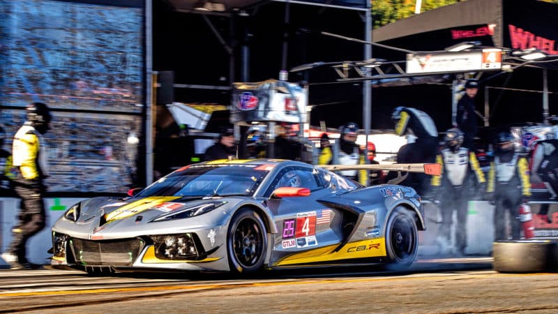 Corvette C8R at 2021 Petit Le Mans speeds away from a pitstop