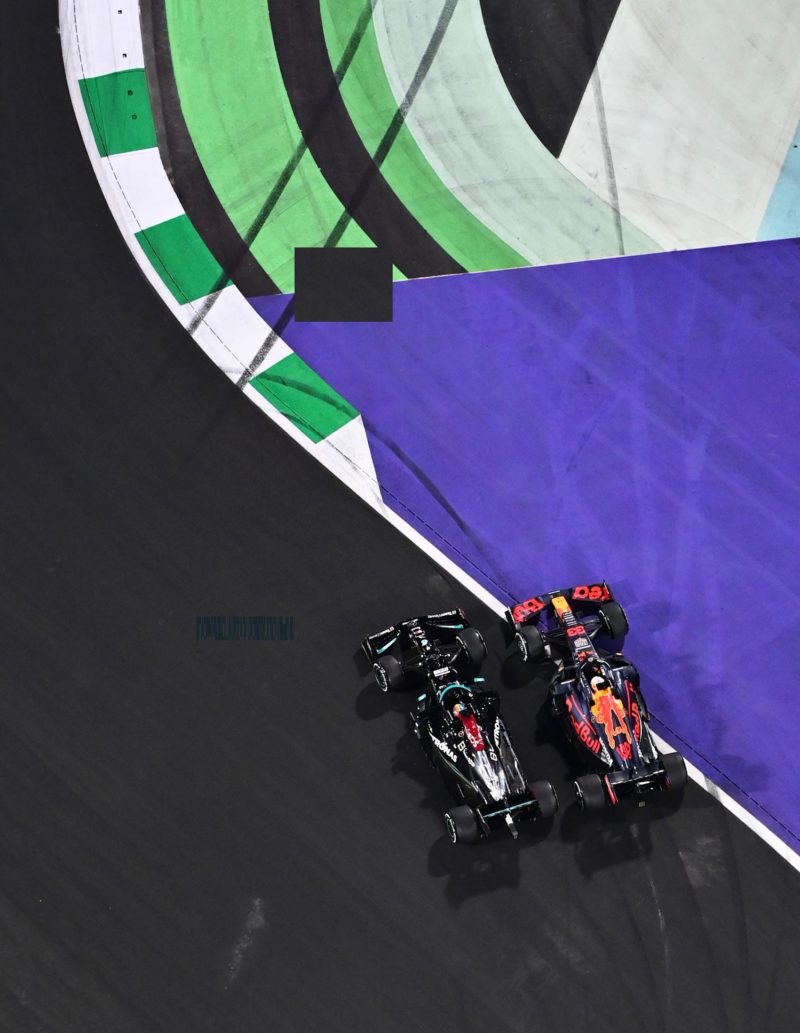 Max Verstappen passes Lewis Hamilton at the 2021 Saudi Arabian Grand Prix