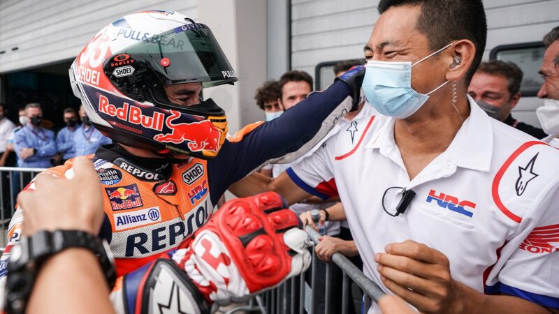 Takeo Yokoyama celebrates with Marc Marquez