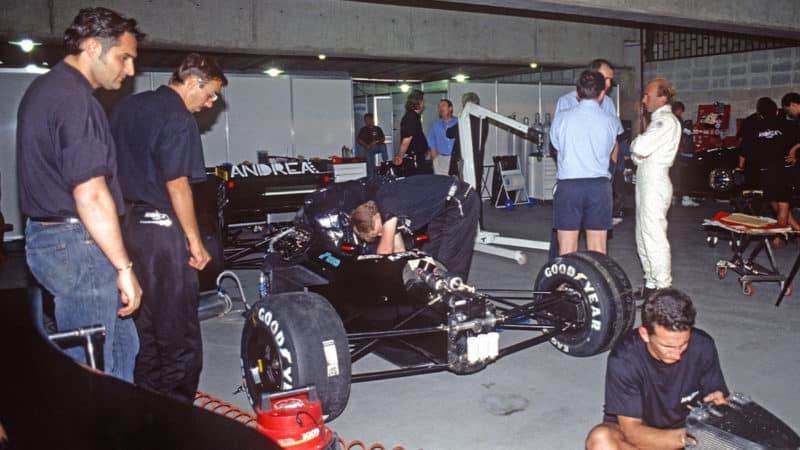 Andrea Moda-Judd pit before nthe 1992 Brasilian Grand Prix with team principal Andrea Sassetti (left) and Perry McCarthy. Photo: Grand Prix Photo