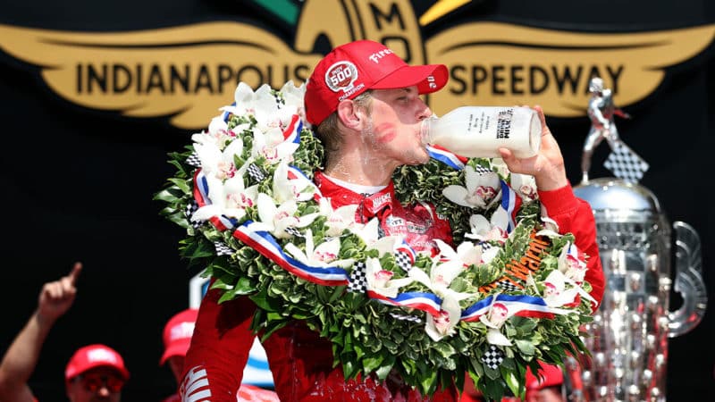 INDIANAPOLIS, INDIANA - MAY 29: Marcus Ericsson of Sweden, driver of the #5 Chip Ganassi Racing Honda, celebrates with milk in Victory Lane after winning the 106th Running of The Indianapolis 500 at Indianapolis Motor Speedway on May 29, 2022 in Indianapolis, Indiana. (Photo by Jamie Squire/Getty Images)