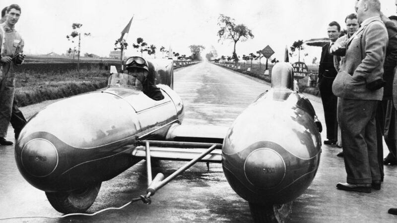 Italian racing driver Piero Taruffi driving his 'Double Torpedo' car, designer by Maserati, as part of a world record attempt, Terracina, Italy, April 5th 1952. (Photo by Keystone/Hulton Archive/Getty Images)