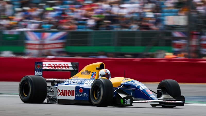 Sebastian Vettel at the 2022 British Grand Prix driving the Mansell race winning Williams FW14B