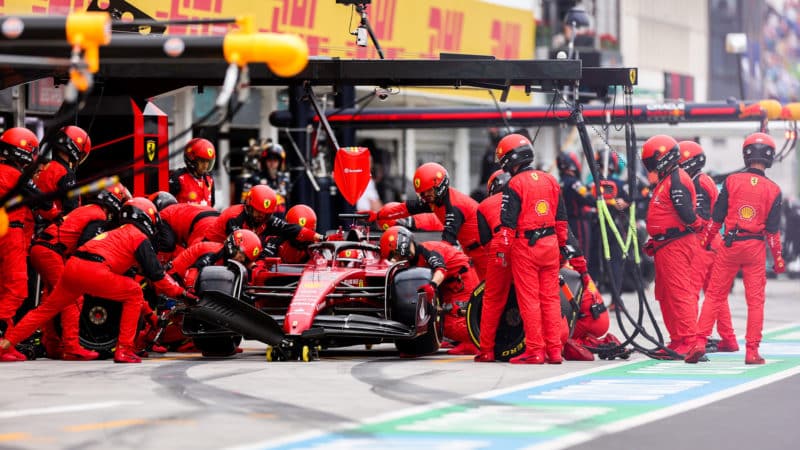 Hard tyres are fitted to the Ferrari of Charles Leclerc in a 2022 Hungarian Grand Prix pitstop