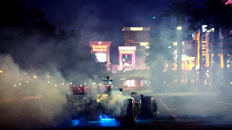 Mercedes rear F1 tyres smoking in front of Las Vegas skyline