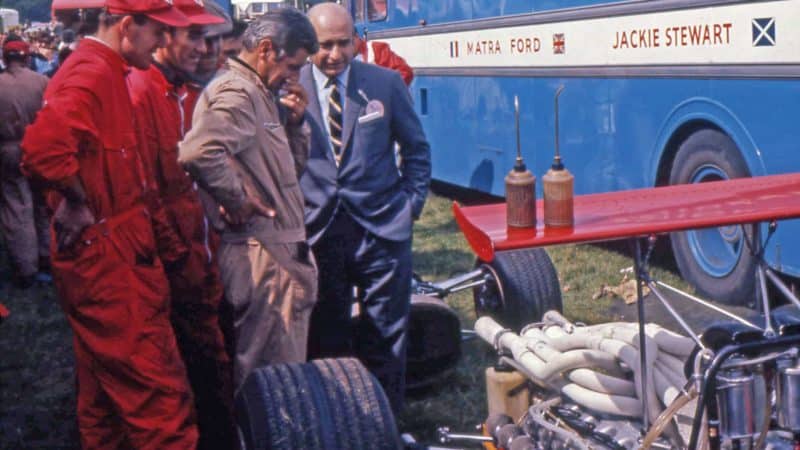 Juan Manuel Fangio inspects Car 01