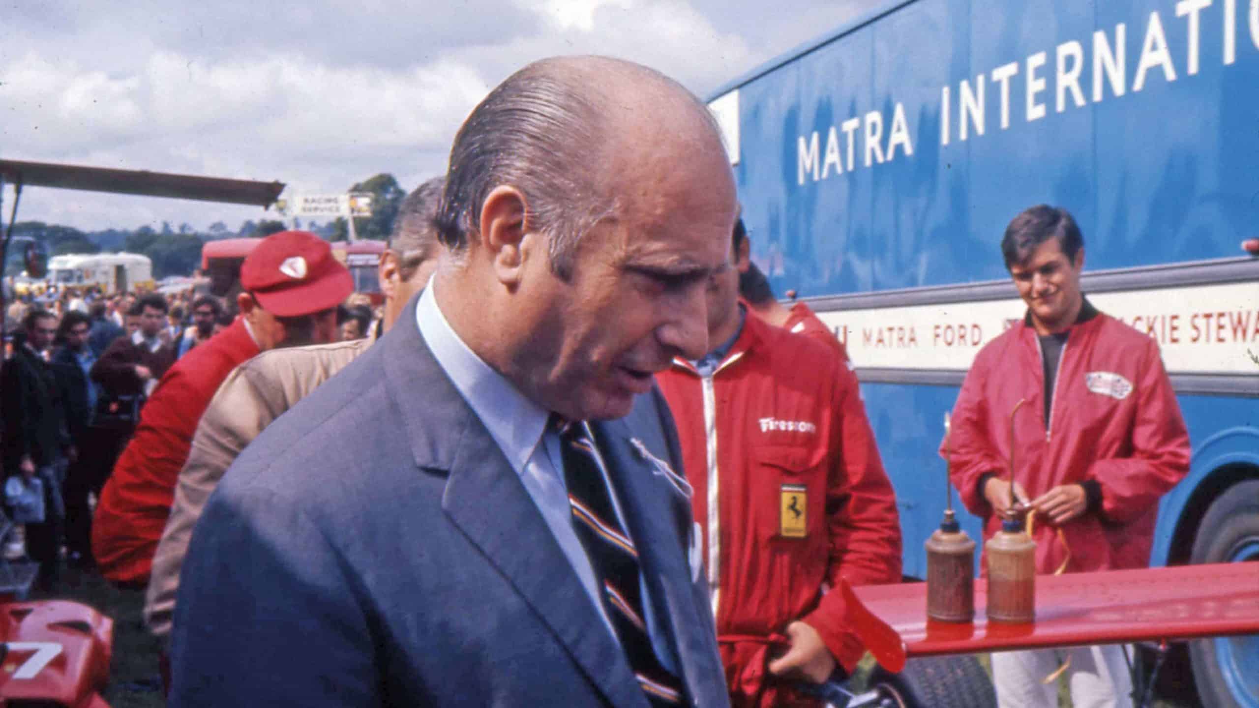 Juan Manuel Fangio inspects Car 02