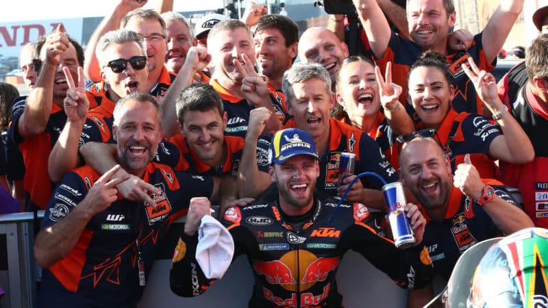 Brad Binder celebrates with KTM team after finishing second at 2022 MotoGP Motegi round