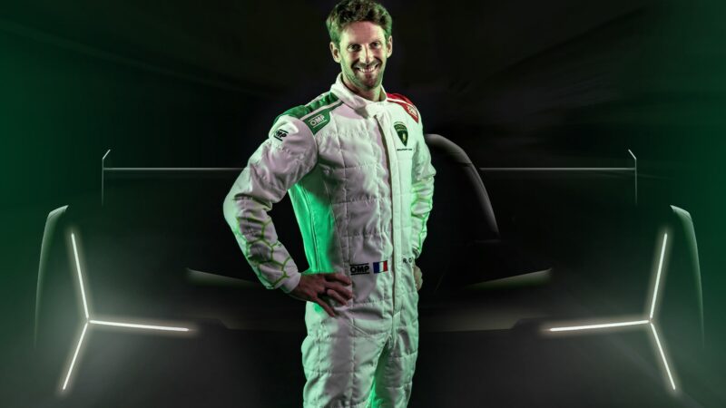 Romain Grosjean in front of Lamborghini LMDh teaser image