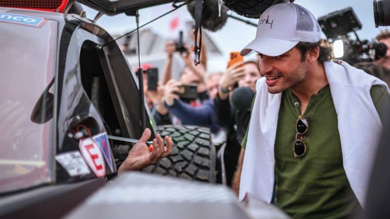 Carlos Sainz jr chats with his dad