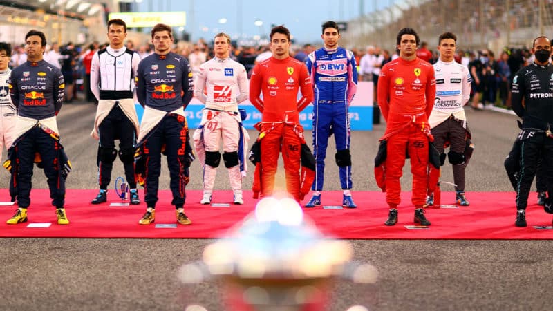 https://www.motorsportmagazine.com/wp-content/uploads/2023/01/F1-drivers-line-up-on-the-grid-at-the-2022-Bahrain-GP-in-Sakhir-800x450.jpg