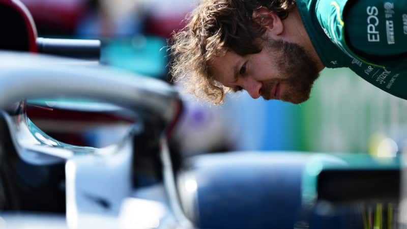 Sebastian Vettel examines Mercedes sidepods at 2022 F1 testing