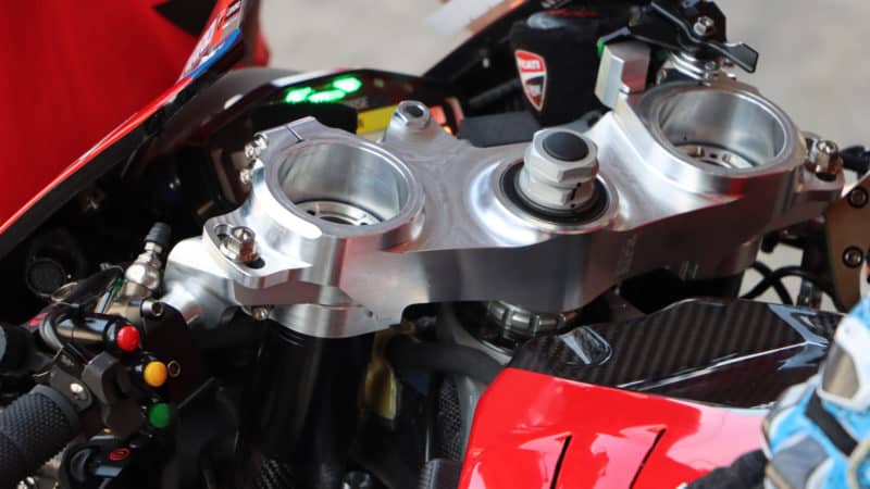 Ducati MotoGP bike with triple clamps on handlebars