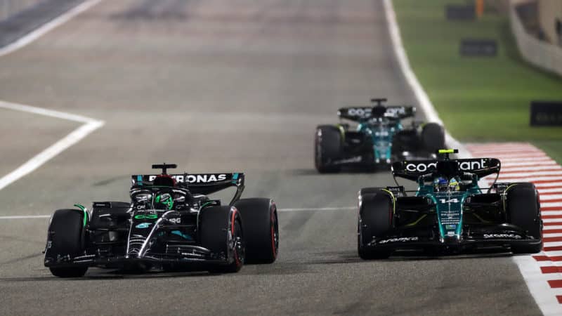 Fernando Alonso fights with George Russell at the 2023 Bahrain Grand Prix