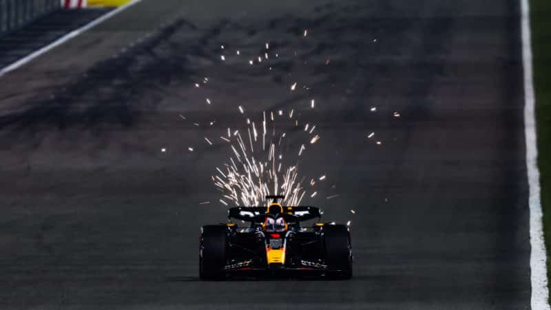 Sparks fly from Red Bull of Max Verstappen driving on his own in the 2023 Bahrain Grand Prix
