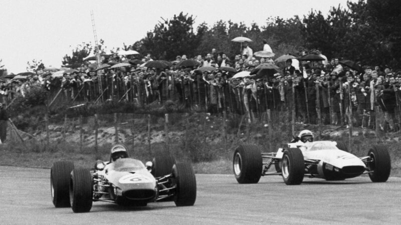 Jochen Rindt passes Graeme Lawrence at Zolder in 1968