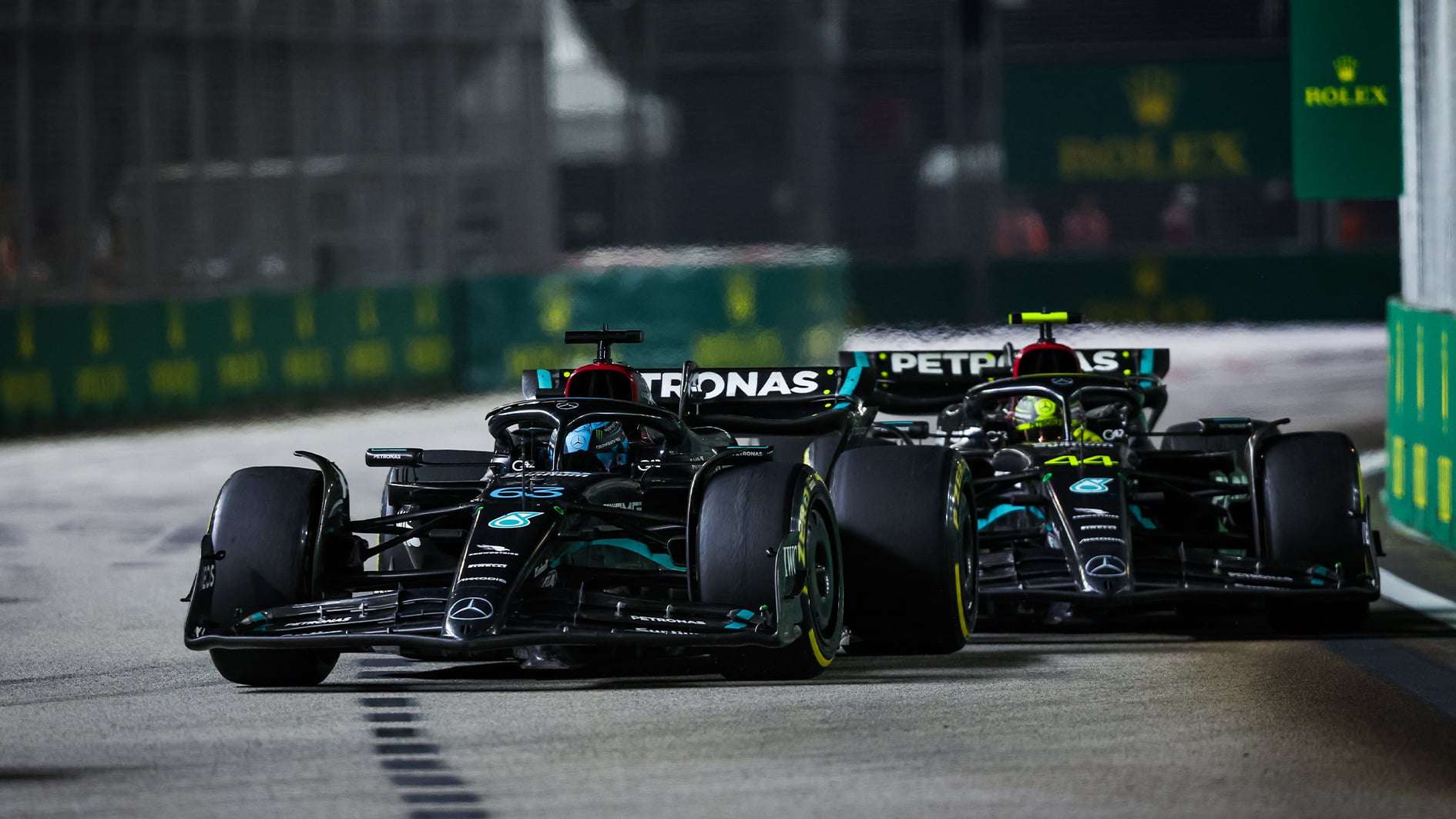 Lewis Hamilton close behind George Russell in the 2023 F1 Singapore Grand Prix