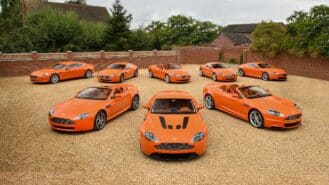 Eight orange Aston Martins cross the block