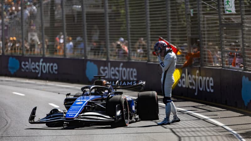 Alex Albon next to crashed Williams in 2024 Australian GP practice