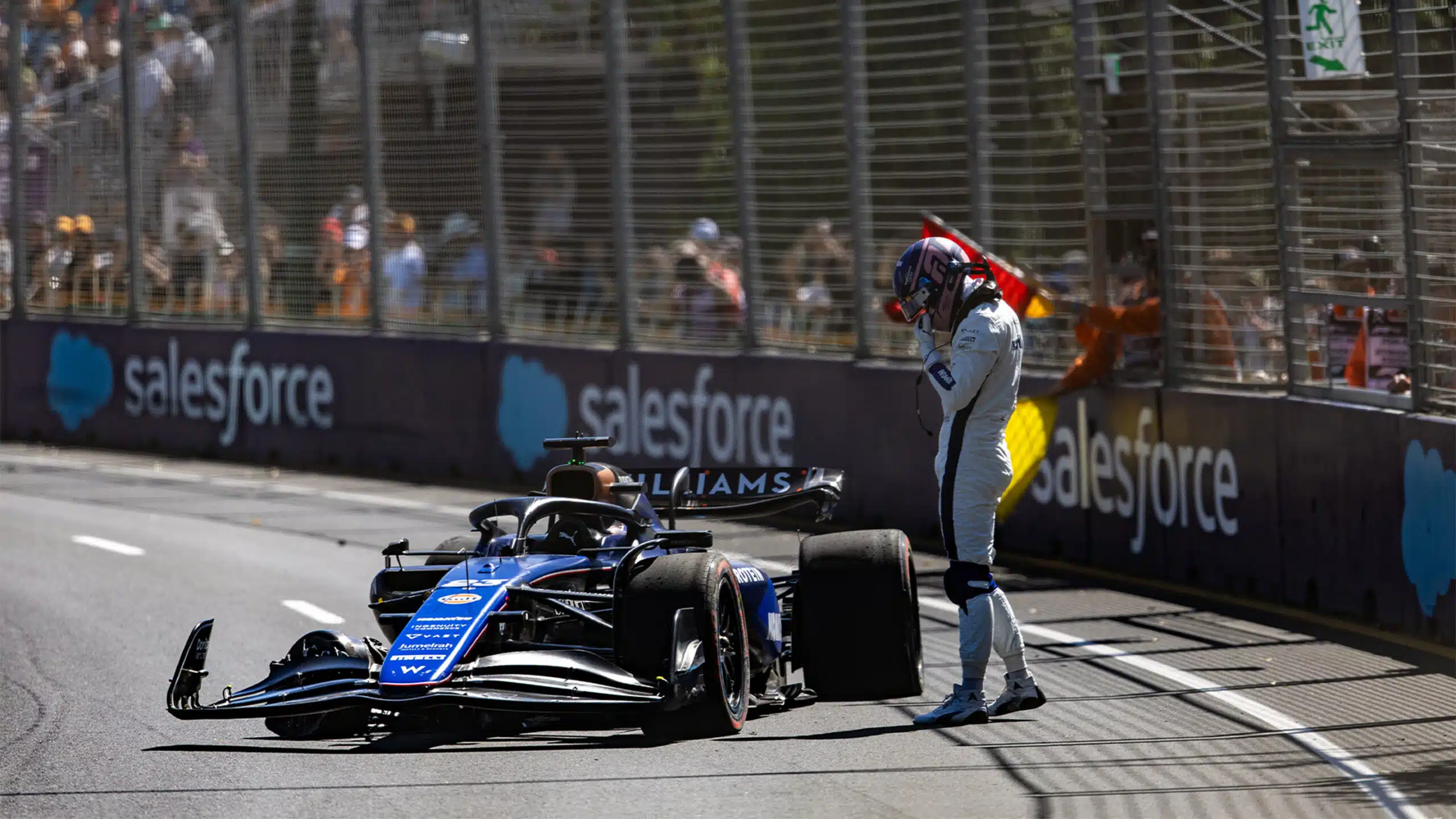 Alex Albon next to crashed Williams in 2024 Australian GP practice