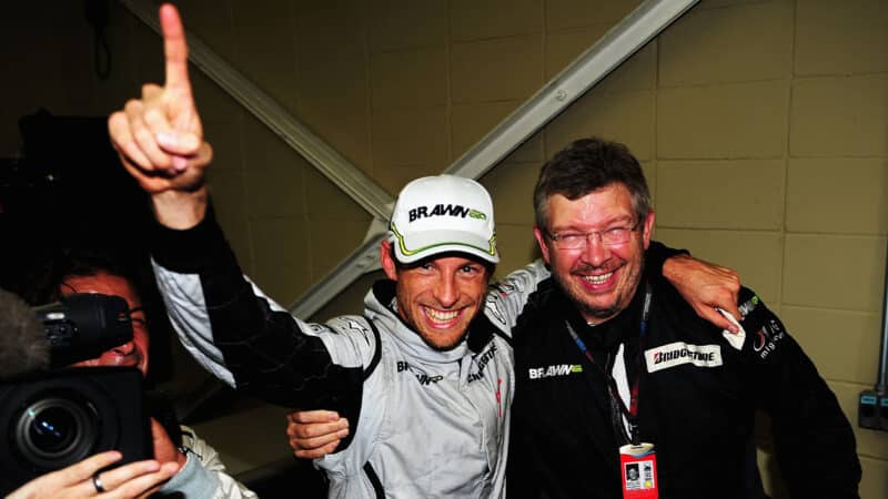 Jenson Button and Ross Brawn celebrate winning the 2009 F1 World Championship