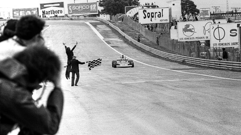 Luca di Montezemolo jumps in the air as Niki Lauda crosses the Jarama finish line to win the 1974 Spanish Grand Prix